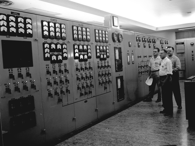 Photograph of H.H. Gillings, William M. Doak, and M. Arnold Taylor at Basic Magnesium, Inc.
