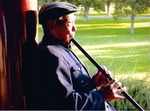 Summer Reading Program Photography Contest 2011, Man with Flute - Beijing, China