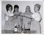 Photograph of Mrs. Albert Gilbert, Peggy Martin, Mrs. Bert Price, and Mrs. Jayne Roberts "toasting the success"