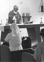 Photograph of a Reverend and Sister in Rose de Lima Hospital chapel