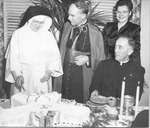 Photograph of Mother Gerald, Bishop Gorman, and Monsignor Lambe celebrating the dedication of Rose de Lima Hospital, October 15, 1947