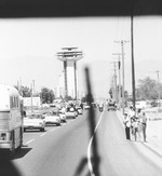 Photograph of President John F. Kennedy's motorcade passing a crowd in Las Vegas, September 28, 1963