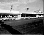 Photograph of Water Street businesses in downtown Henderson, May 1, 1964