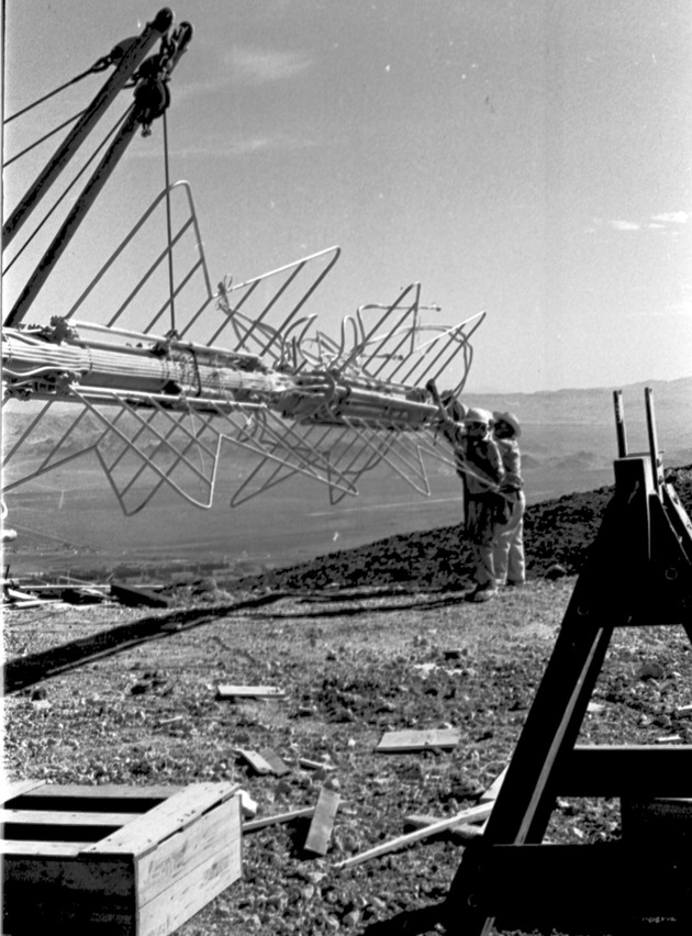 Photographs of men installing the television transmitter tower antenna on Black Mountain, July 1, 1967 - New Page