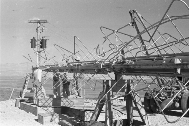 Photographs of men installing the television transmitter tower antenna on Black Mountain, July 1, 1967 - New Page