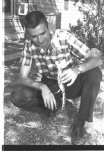Photograph of Frank Wortman and an alligator, Henderson, 1963