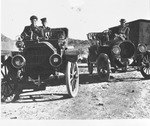 Photograph of men posing in convertible automobiles, Henderson