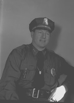 Portrait photograph of Police Chief George Crisler, 1954