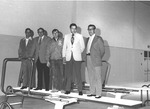 Photograph of City Councilmen and Mayor at opening of Henderson's first indoor swimming pool, December 15, 1973