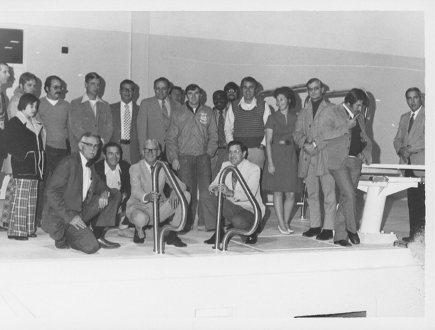 Photograph of a group of people at opening of Henderson's first indoor swimming pool, Henderson, December 15, 1973