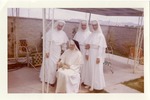 Photograph of Sister Madonna with fellow nuns on a patio, Henderson, August 1969