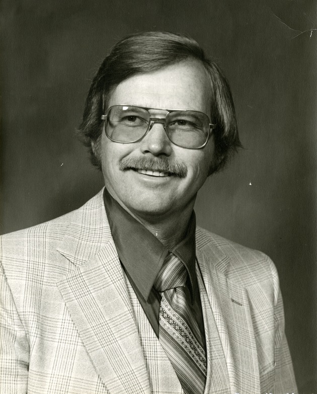 Portrait photograph of Henderson Chamber of Commerce president Charles Spradlin