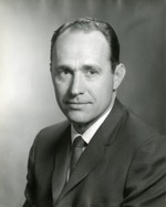 Portrait photograph of Henderson Chamber of Commerce president Dan J. Reed
