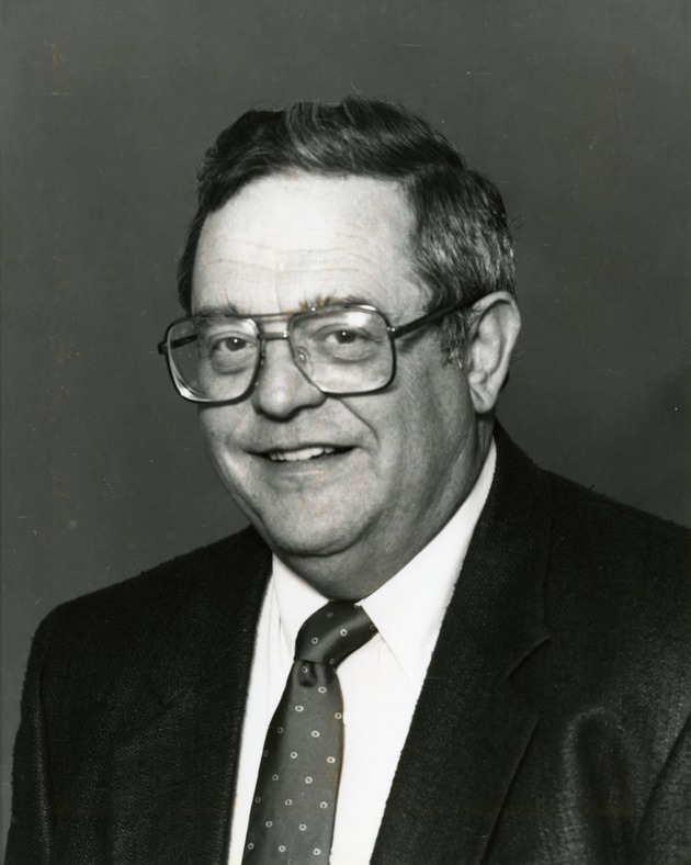 Portrait photograph of Henderson Chamber of Commerce president John Flaherty