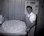 Photograph of Prime Meats 7th anniversary cake, Henderson, April 1956