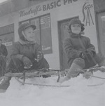 Photograph of boys on playing on sleds, Henderson, January 1955