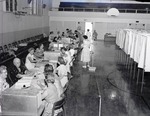 Photograph of the Townsite School Auditorium voting booths, Henderson, August 30, 1955
