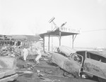 Photograph of fire damage to Kelly-Green War Surplus Store, Henderson, February 9, 1955