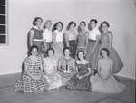 Photograph of young women with a softball trophy, Henderson, September 1956