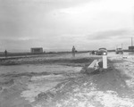 Photograph of overflowing wash caused by a flood, Henderson, July 24, 1955