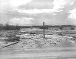 Photograph of a flood-damaged road, Henderson, July 24, 1955