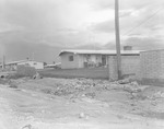 Photograph of a flood-damaged wall, Henderson, July 24, 1955
