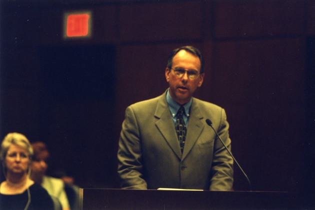 Photograph of Mayor Jim Gibson speaking at Kent Dawson's swearing-in, Henderson, Nevada, May 2000