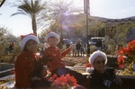 Photograph of people enjoying the Henderson City Hall Christmas celebration, Henderson, Nevada, December 1997