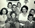 Photograph of Ernest Lomprey with his family, 1949