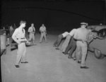 Photograph of Henderson police searching men, Henderson, September 1954