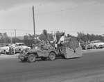 Photograph of the Henderson Girl Scouts float in the Industrial Days parade, Henderson, May 7, 1955