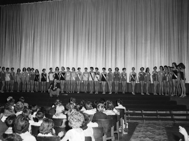 Photograph of the Industrial Days beauty pageant contestants on stage, Henderson, May 7, 1955
