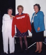 Photograph of Lois Hampton awarded Top Gun Jacket, March 20, 1998