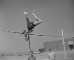 Photograph of a pole vaulter, Henderson, 1957