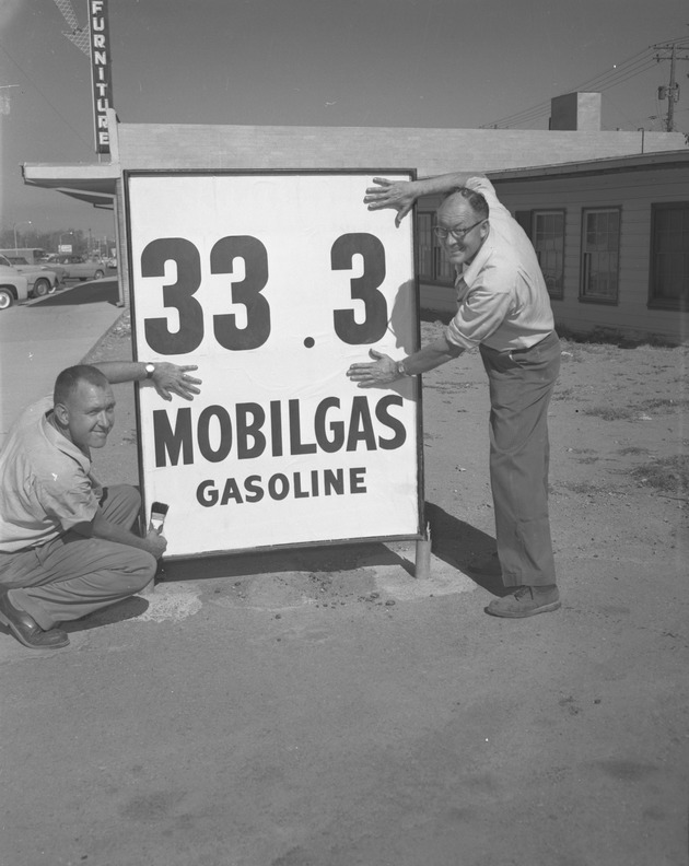 Photograph of a gasoline price sign, Henderson, September 1957