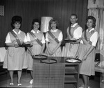 Photograph of servers at Rose de Lima hospital, Henderson, February 1965