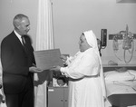 Photograph of an Intensive Care Unit plaque, Henderson, August 15, 1968