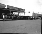 Photograph of a crowd waiting in line at the Victory Theater, Henderson, 1952