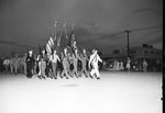 Photograph of men marching in the Veteran's Day celebration, Henderson, November 11, 1946