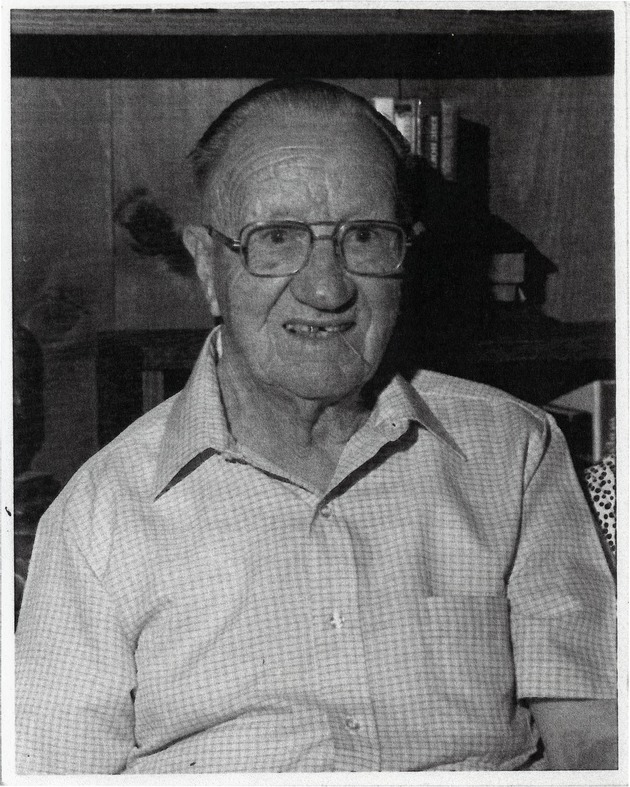 Paul E. Zink wearing glasses